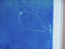 Gabriel (age 2) drew this fish in chalk on his wall while I was drawing his life sized orca...